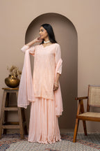 Peach Georgette Sharara Dress with Mukaish & Chikankari – Festive Grace